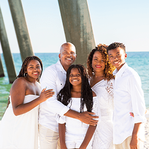 Group of 5 people on a beach